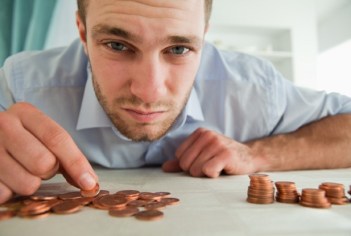 guy counting pennies